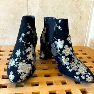Anne Klein. Like new black booties with flower embroidery.